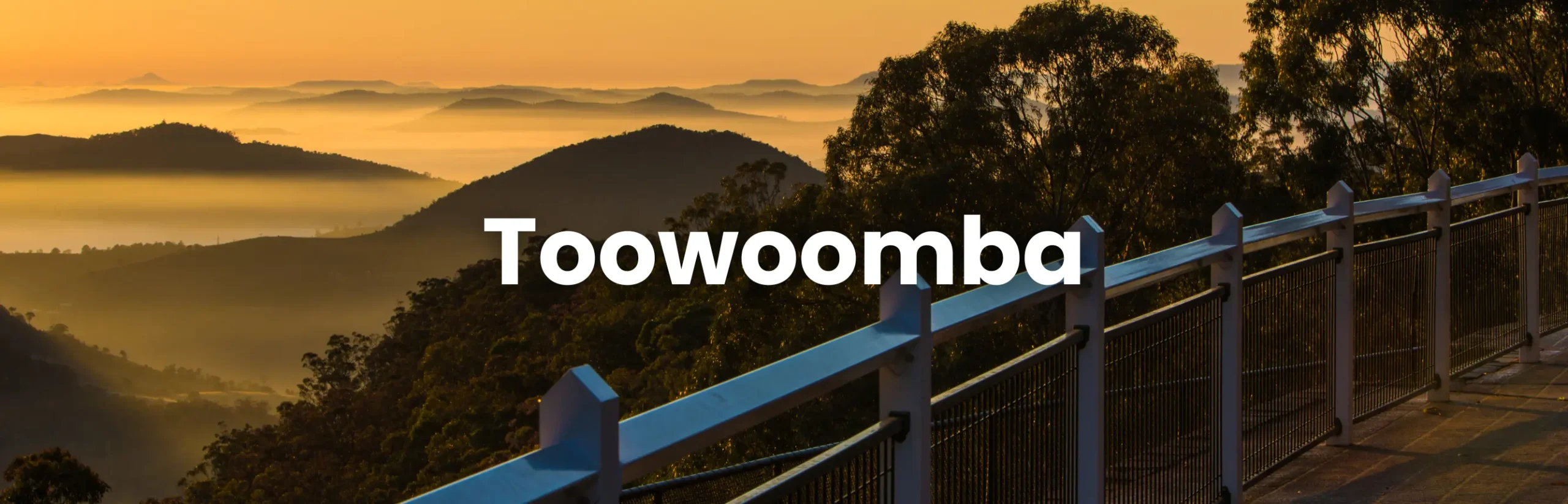 Sunrise view over the Toowoomba Range from a scenic lookout, capturing the peaceful setting of the Toowoomba Conference.